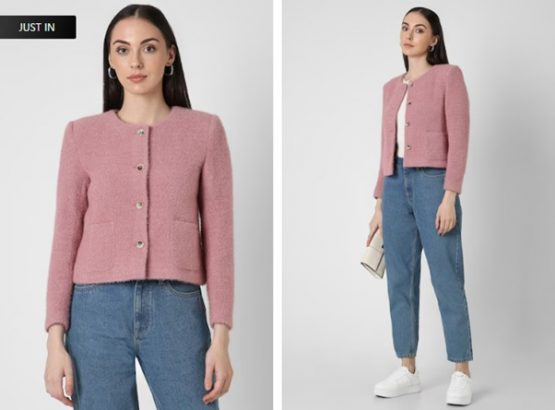 Tailored Wool Coats: Woman in pink cardigan, blue jeans, white sneakers, holding a clutch.