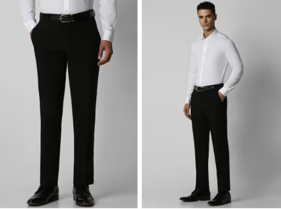 Two poses of a person modeling black trousers and a white shirt with a belt and black shoes.