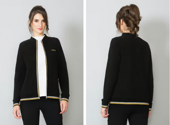 Front and back view of a woman in a black zip-up jacket with white and yellow trim.