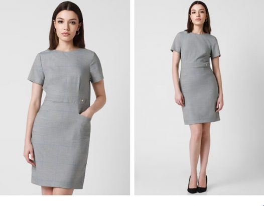 Woman in a gray short-sleeved dress and black heels, viewed from front and side.