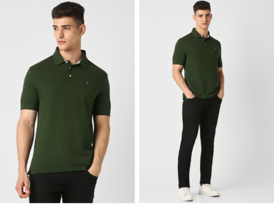 Man wearing a green polo shirt paired with black pants and white sneakers.