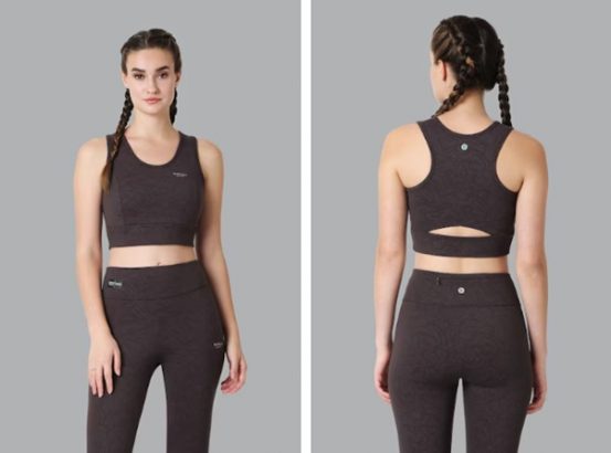 A woman in a patterned sports bra and leggings, shown from front and back.