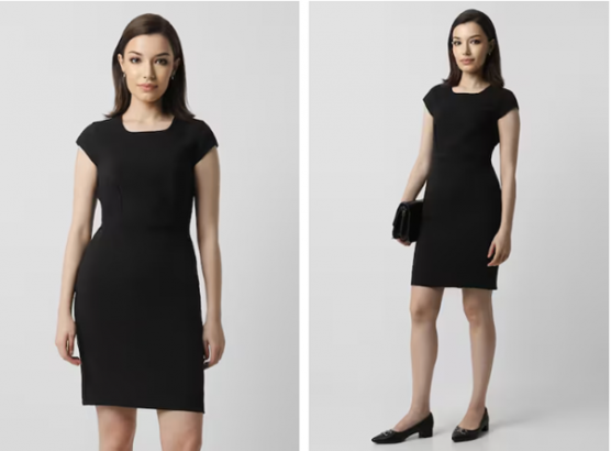 a woman wearing a black dress and heels
