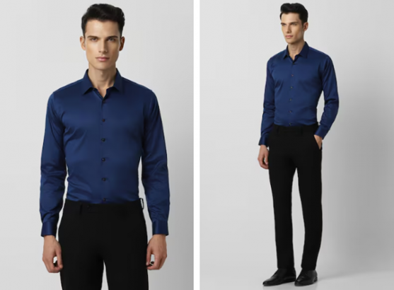 a man in a blue shirt and black pants