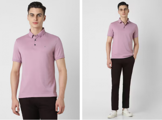 a man in a pink shirt and black pants