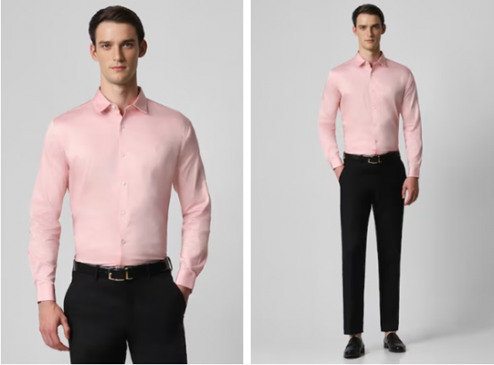 a man in a pink shirt and black pants