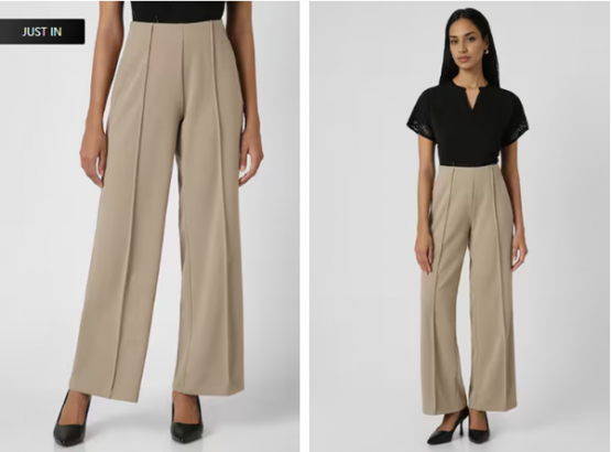 a woman in a black top and tan pants
