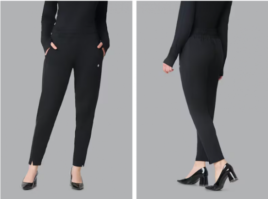 a woman wearing black pants and heels