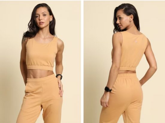 Woman modeling beige crop top and joggers, front and back view.