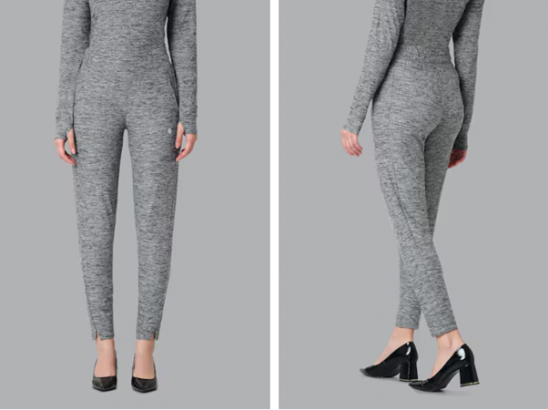 a woman in a grey bodysuit and high heels