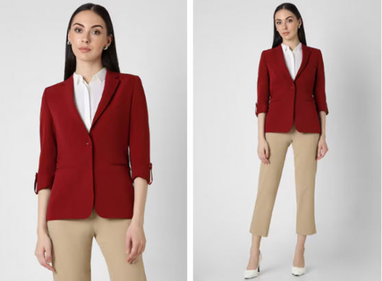 a woman in a red jacket and tan pants
