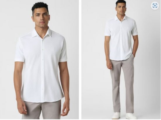 Man in a white shirt and gray trousers paired with white sneakers.